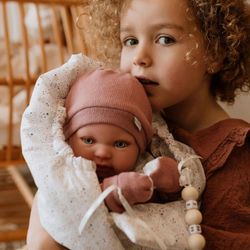 Muñeca Reborn 45 Cm Mia con Saco de Dormir - Arias